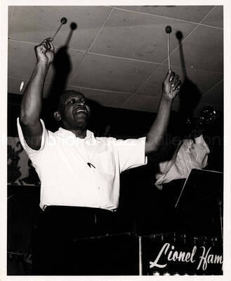 10 x 8 inch photograph. Lionel Hampton playing the vibraphone [at an U.S. Air Force base abroad?]