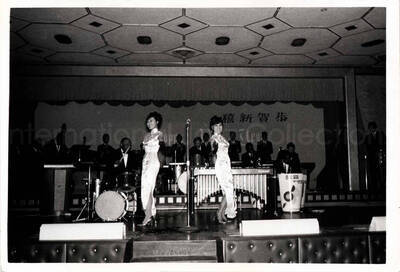 3 1/2 x 5 inch photograph. Lionel Hampton's band with two unidentified women dressed in Japanese costume, dancing in Japan
