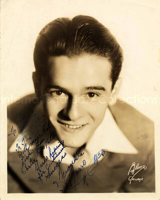 10 x 8 inch photograph. Unidentified man. This photograph is dedicated to Lionel Hampton from Frankie [Tasso?]