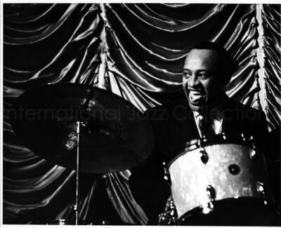 8 x 10 inch photograph. Lionel Hampton performing on the drums [in Japan]
