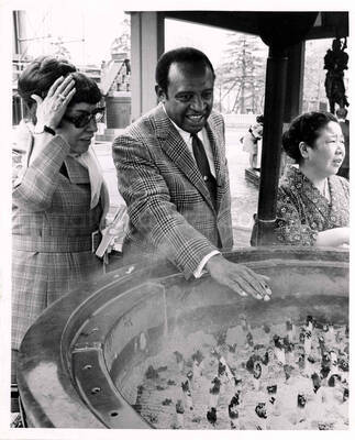 10 x 8 inch photograph. Gladys and Lionel Hampton in downtown Tokyo, Japan