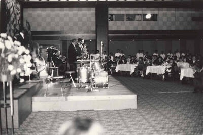 3 x 4 1/2 inch photograph. Lionel Hampton playing the drums with band, in Osaka, Japan