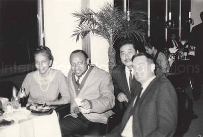 3 x 4 1/2 inch photograph. Lionel Hampton with unidentified persons, in Osaka, Japan