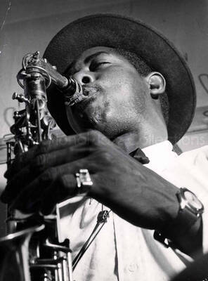 9 1/2 x 7 inch photograph. Unidentified saxophonist [Turin, Italy?]