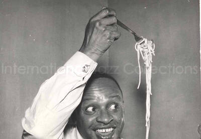 9 1/2 x 7 inch photograph. Lionel Hampton [in Italy]. This photograph is ripped off (5 x 7 inch)