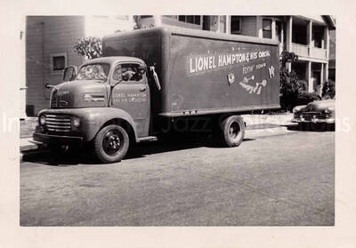 3 1/4 x 4 1/2 inch photograph. Lionel Hampton and His Orchestra's truck; Flyin' Home