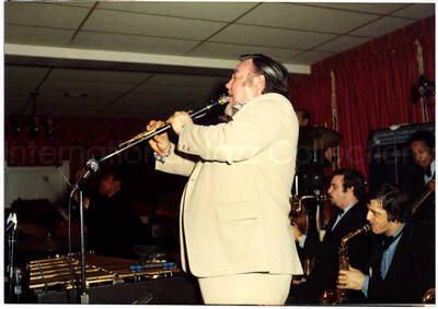3 1/2 x 5 inch photograph. Lionel Hampton on vibraphone with unidentified clarinetist