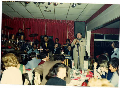 3 1/2 x 5 inch photograph. Lionel Hampton on vibraphone with unidentified clarinetist