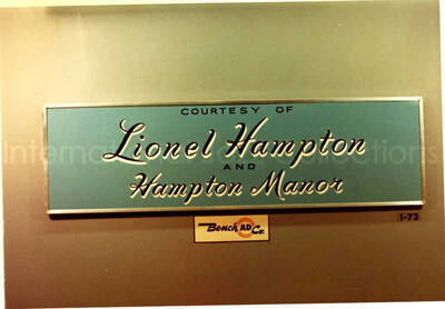 3 1/2 x 5 inch photograph. A plaque on a wall with the inscription: Courtesy of Lionel Hampton and Hampton Manor