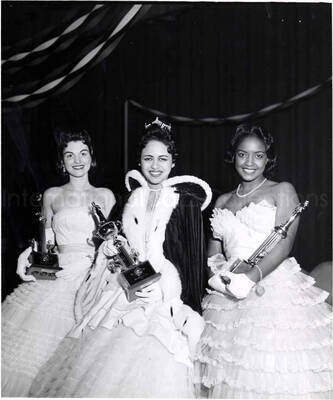 10 x 8 inch photograph. Unidentified women holding trophies