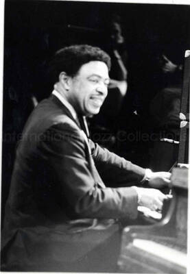 8 x 10 inch photograph. Wild Bill Davis playing the piano