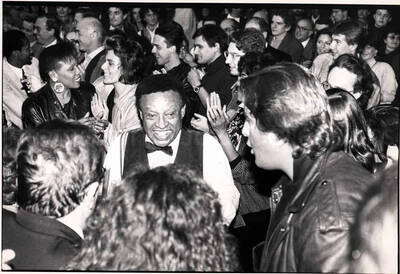 7 x 9 1/2 inch photograph. Lionel Hampton and Dee Dee Bridgewater among audience [in Italy]