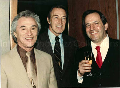 8 x 11 inch photograph. Three unidentified men at the Charles Hotel, Boston. From a scrapbook