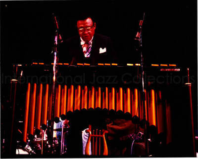 8 x 10 inch photograph. Lionel Hampton playing the vibraphone