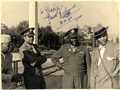 7 x 9 inch photograph. Col. Herbert Julian, Soldier of Fortune. This photograph is dedicated to Gladys Hampton