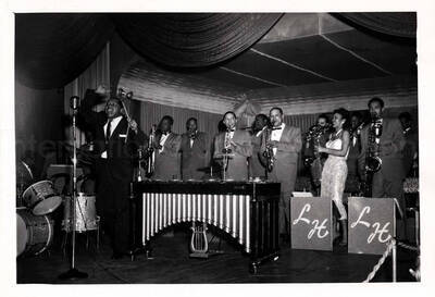 5 x 7 inch photograph. Lionel Hampton performing with orchestra [in Canada?]