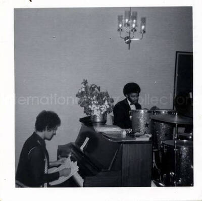 3 1/2 x 3 1/2 inch photograph. Unidentified musicians