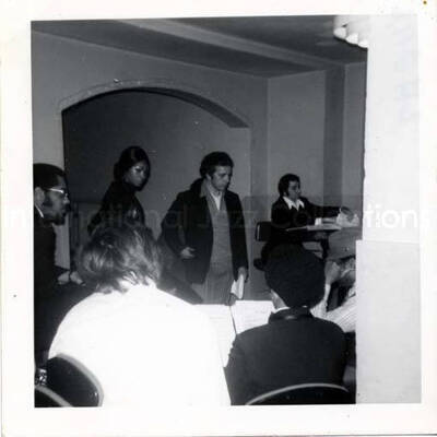 3 1/2 x 3 1/2 inch photograph. Unidentified persons