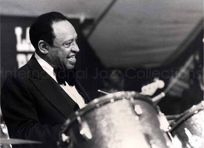 7 x 9 inch photograph. Lionel Hampton playing the drums