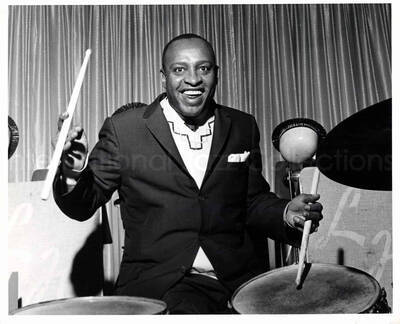 8 x 10 inch photograph. Lionel Hampton playing the drums