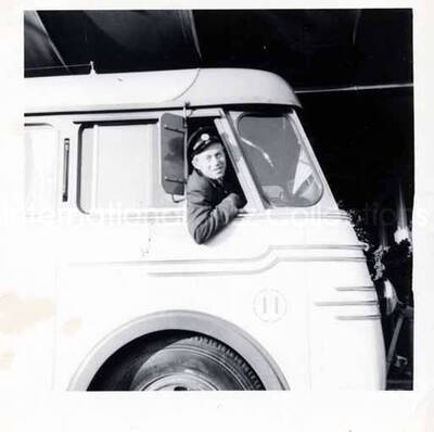 3 1/2 x 3 1/2 inch photograph. Unidentified man