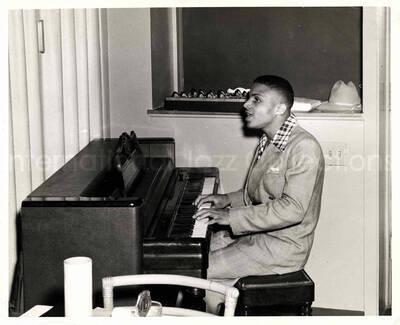 8 x 10 inch photograph. Unidentified pianist