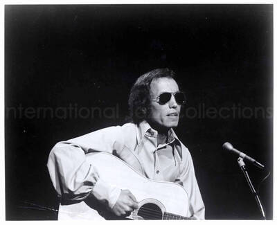 8 x 10 inch photograph. Unidentified guitarist
