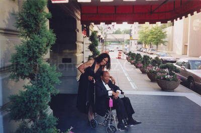 4 x 6 inch photograph. Lionel Hampton with unidentified woman at the Westin Hermitage hotel in Nashville, TN