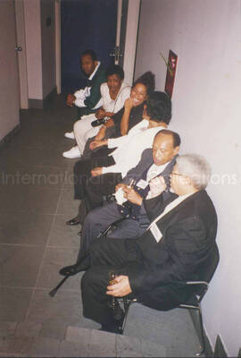 6 x 4 inch photograph. Lionel Hampton with unidentified persons at a fashion show