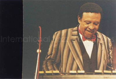 5 x 7 1/2 inch photograph. Lionel Hampton playing the vibraphone, in Canada