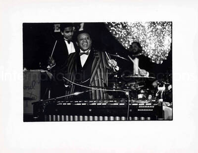 9 1/2 x 12 inch photograph. Lionel Hampton playing the vibraphone [in France?]