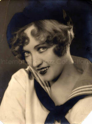 12 x 9 inch photograph. Portrait of an unidentified woman