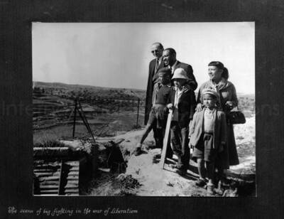 8 x 10 inch photograph. Lionel Hampton in Israel. This photograph is in a photo album titled: In the Holy City - Jerusalem. Caption under the photograph reads: The scene of big fighting in the war of Liberation
