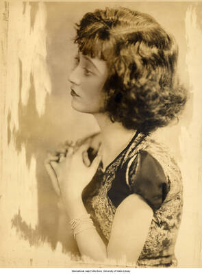 Black and white photograph of Lee Morse in profile. 