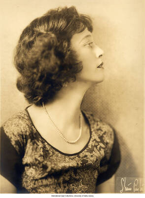 Black and white photograph of Lee Morse in profile. 