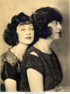 Black and white photograph of Lee Morse and an unidenfitied person.