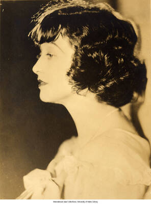 Black and white photograph of Lee Morse in profile. 