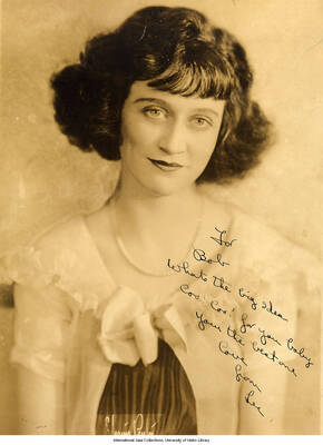 Black and white photograph of Lee Morse. Inscription: For Bob  Whats the big idea  Coo!  Coo!  For you baby  Your the best one  Love from Lee