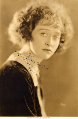 Black and white photograph of Lee Morse. Inscription: For "My Little Bobby"  From Lee.  