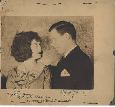 Black and white photograph of Lee Morse and Bob Downey. Inscription reads: "For Jackie Boy  Beloved little Son  Mother & "Daddy" Bob.