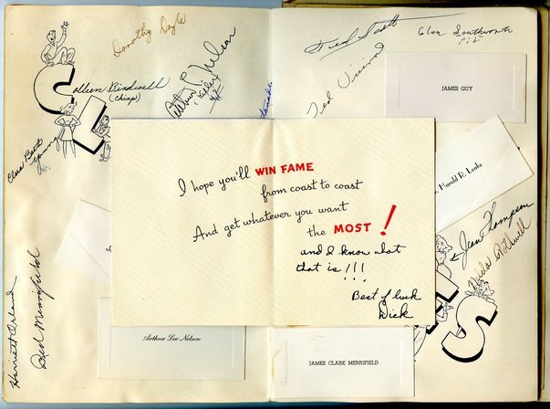 Open graduation card and signatures of classmates in John Fourt's school memories scrapbook