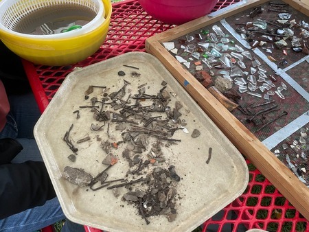 Photo taken in the field at MHS 2023 dig of artifact trays