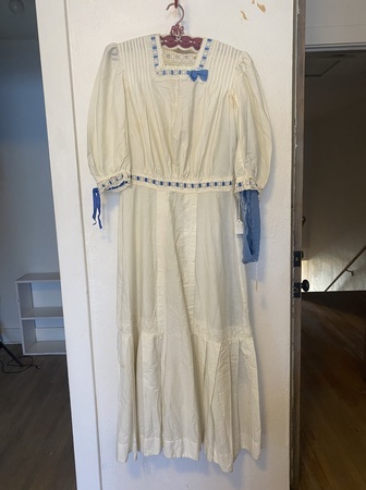 Womens graduation dress from Moscow, 1912, with mother of pearl buttons