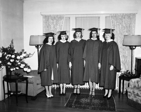 Graduation pictures, one of the students present is likely Mary Driscoll