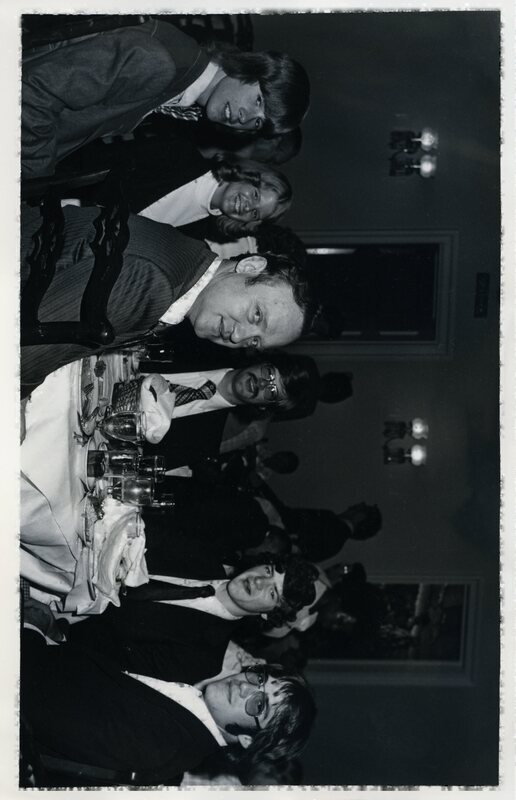 Senator James A. McClure sits at a table with his sons, Kenneth and David; future daughter-in-law Sally; and unidentified others.