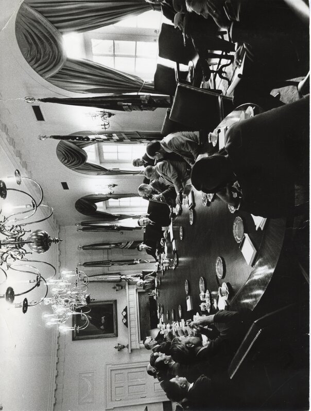 Senator James A. McClure sits to President Gerald Ford's right at a meeting in the White House.