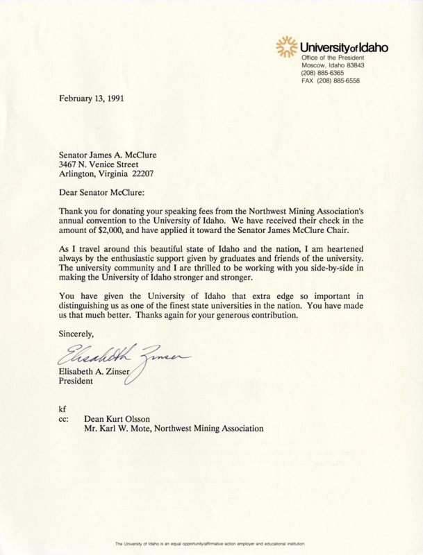 University of Idaho president Elisabeth A. Zinser thanks Senator James A. McClure for donating his speaking fees from the Northwest Mining Association's annual convention at the University of Idaho.