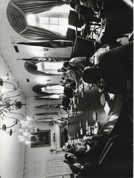 Senator James A. McClure sits to President Gerald Ford's right at a meeting in the White House.