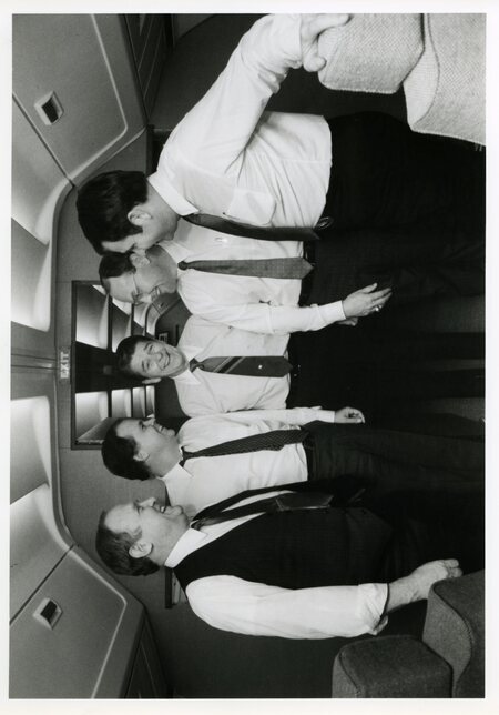 Photograph of Senator James A. McClure, Representative Richard H. Stallings, President Ronald Reagan, Representative Larry E. Craig, and Senator Steven D. Symms gathered aboard Air Force One.