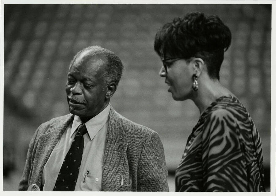 7" x 5" black and white photograph. Hank Jones and Dee Daniels together, possibly at a soundcheck.